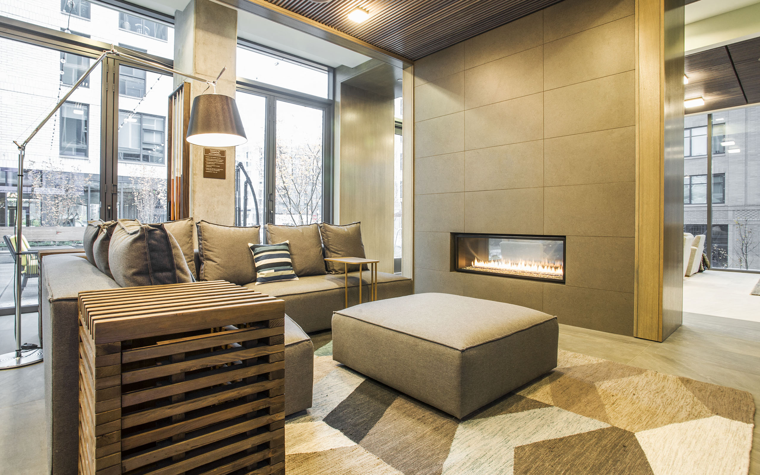 Block 17 Apartments Clubhouse Indoor Fireplace and Sitting Area